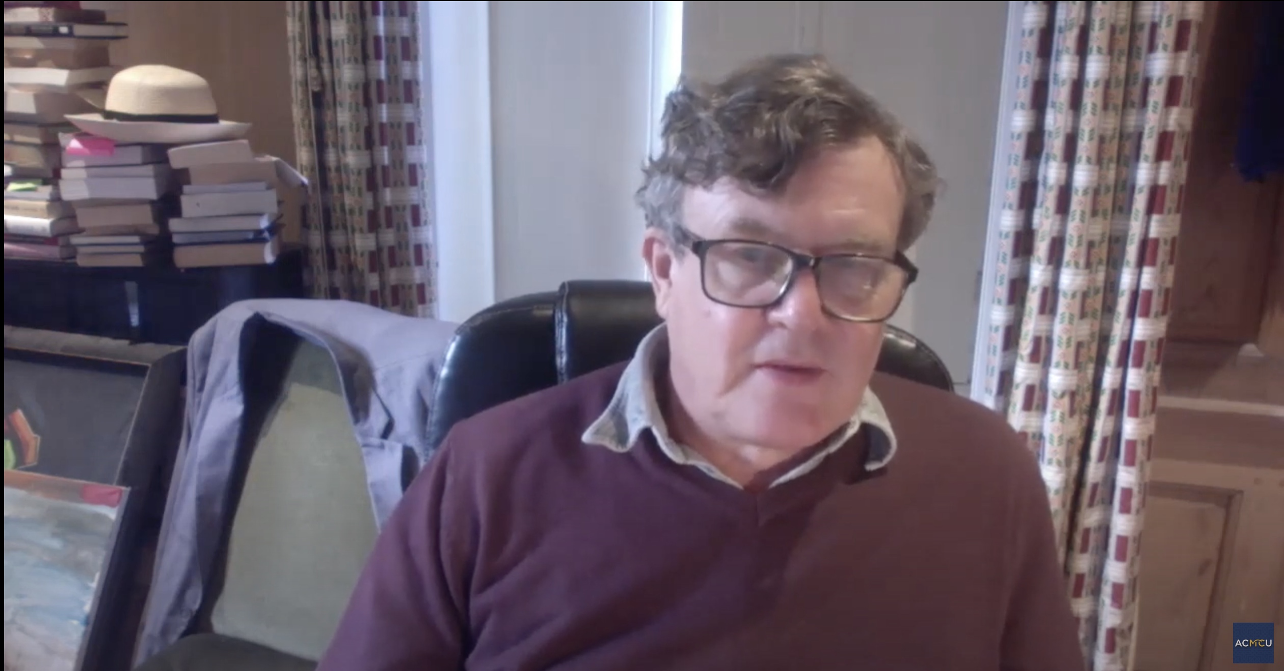 Author Peter Oborne sits in his home office